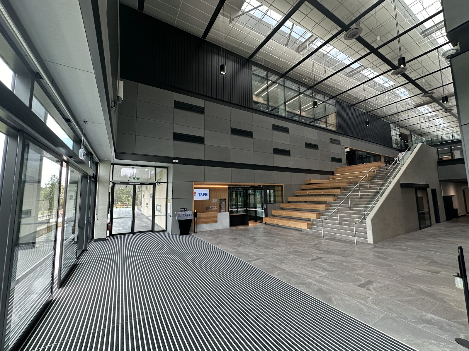 Entrance matting fitout at The Institute of Applied Technology for Construction (IATC) at TAFE in New South Wales.