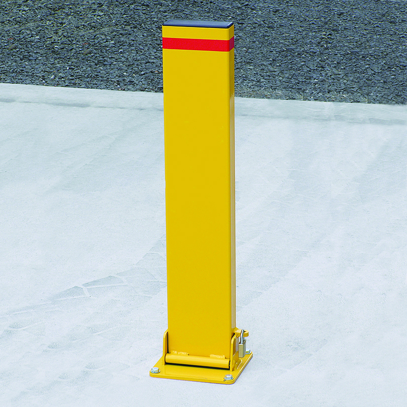 A yellow powder coated collapsible bollard installed by Classic Architectural Group.