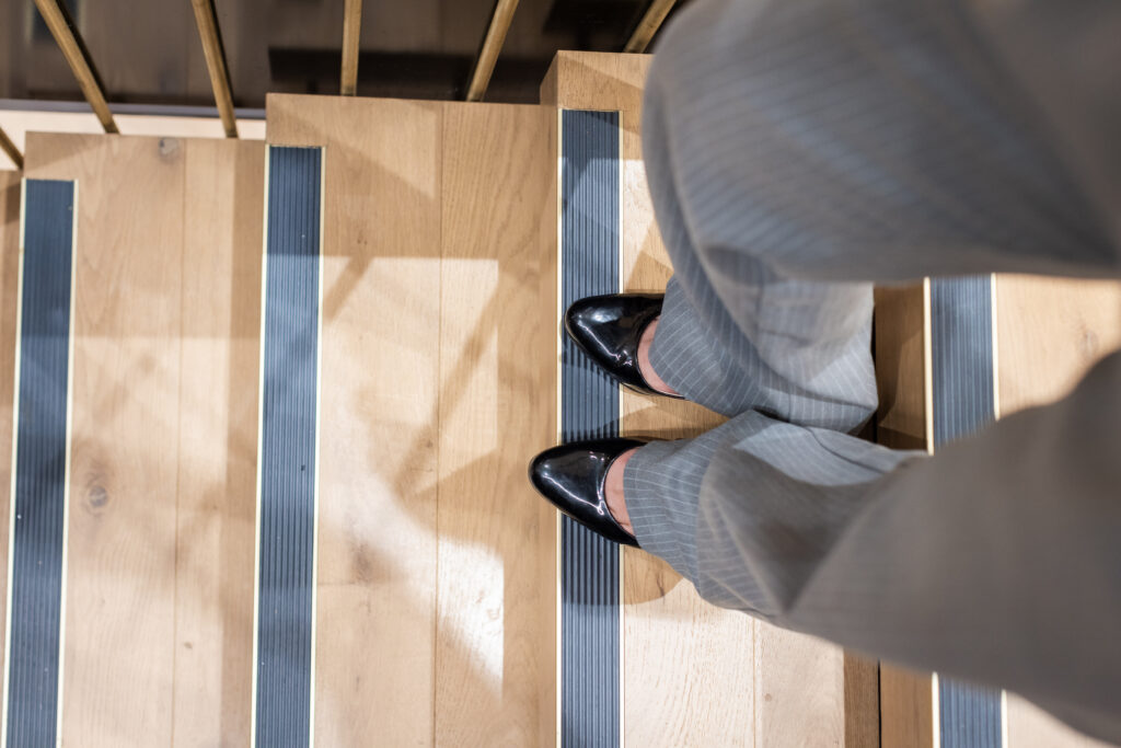 stair treads installed on the edge of step for extra grip and visibility