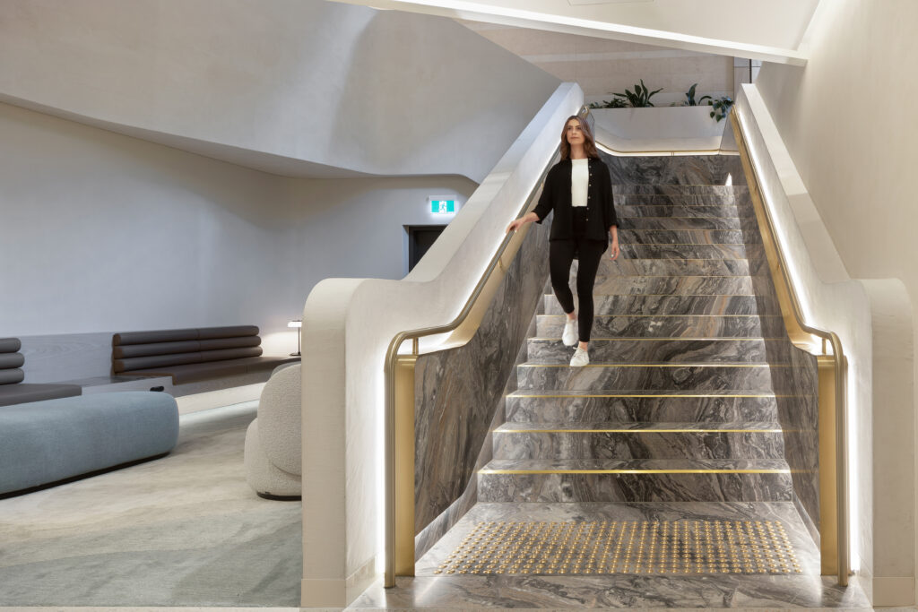 slip-rated solid brass stair nosings installed at 555 collins st