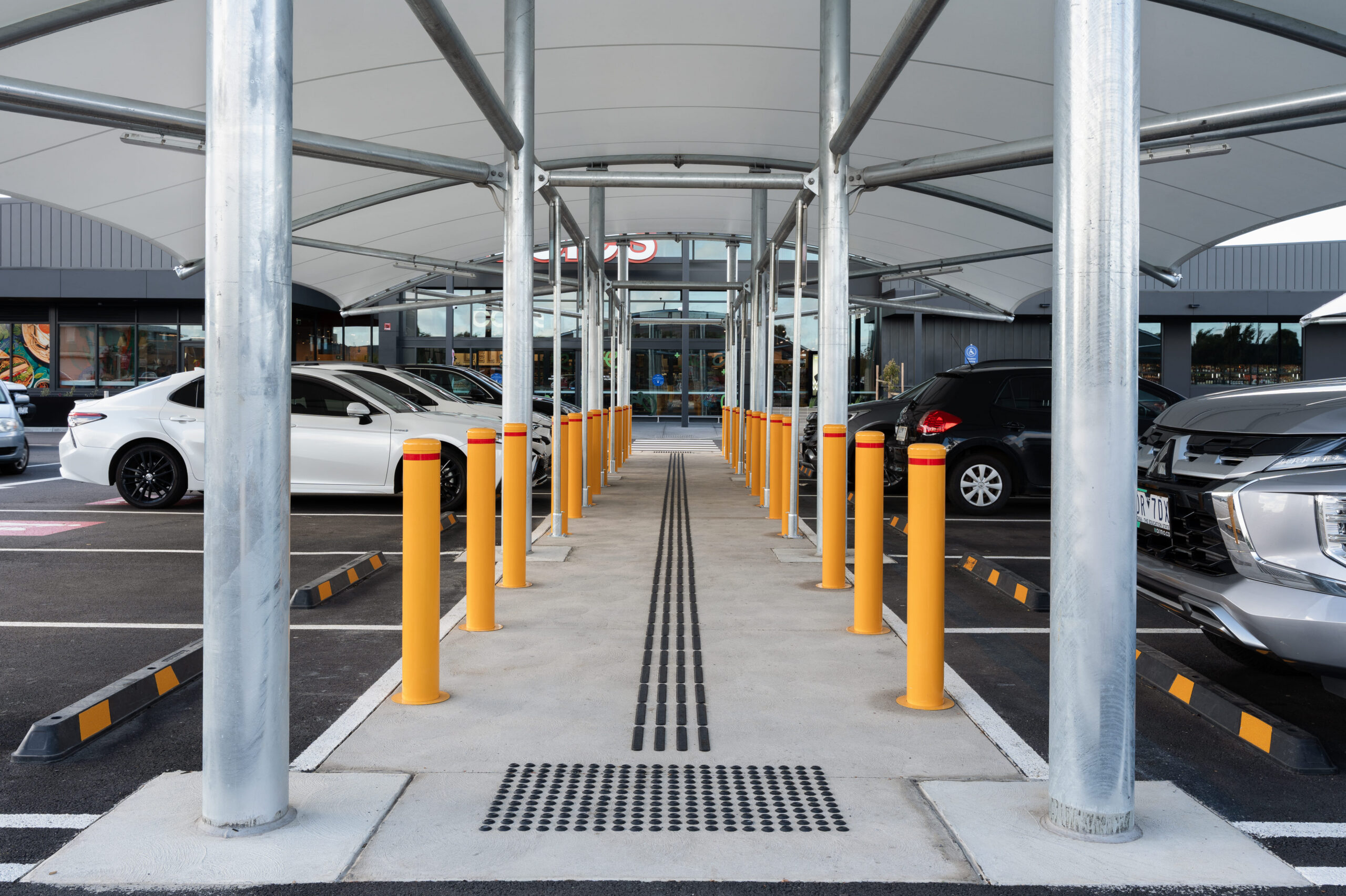 powder coated bollards installed for shopping centre car park